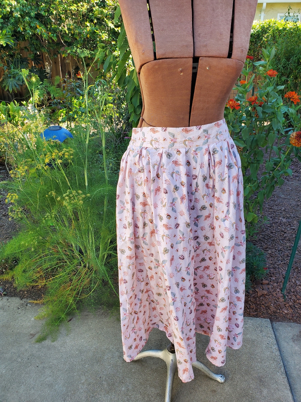 Retrolicious Pink Bug Pleated Midi Skirt